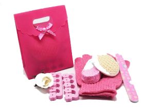 5 piece beauty set in a hot pink tab top box gift bag (exfoliating gloves, pumice stone, emery board, toe seperator & facial sisal pad)